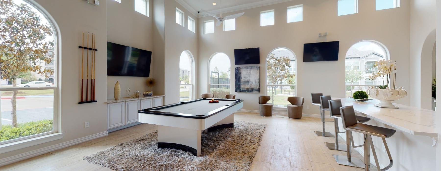 a large room with a large table and chairs