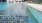 a pool with a fence around it